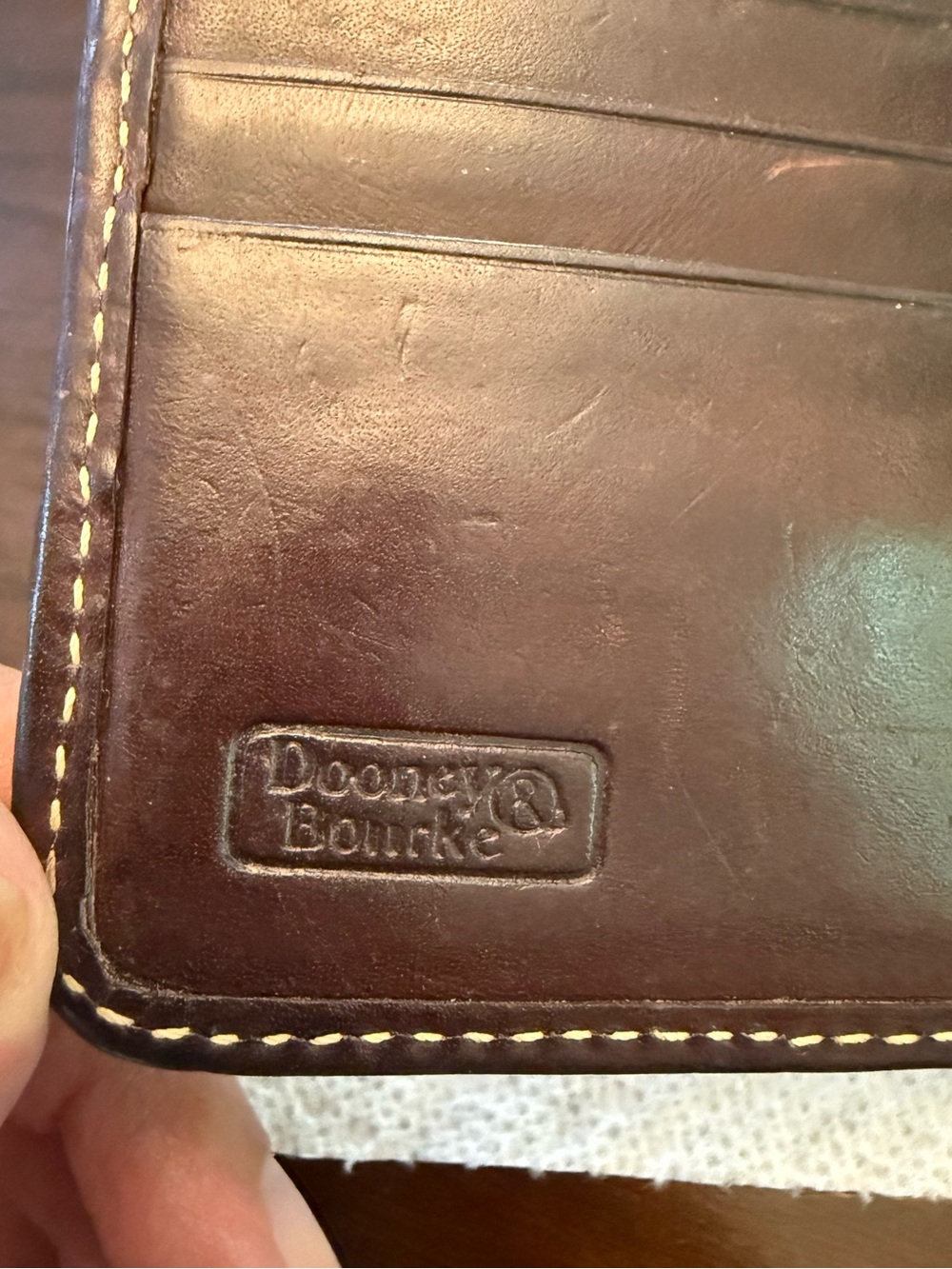 Vintage Dooney & Bourke
Donegal Crest Wallet Florentine & Pebble Leather - Picture 7 of 14